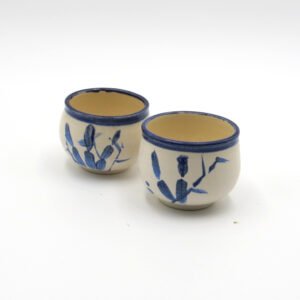 White Ceramic Teacups with Blue Strokes